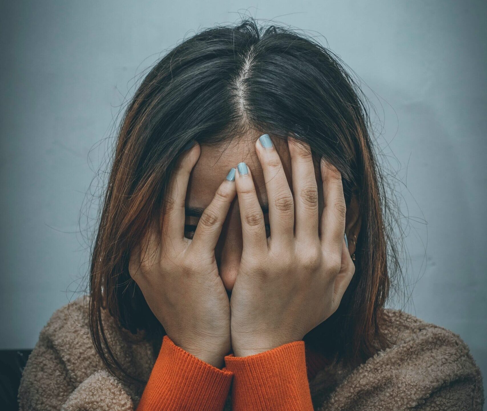 hypnotherapy for eczema, little girl covering her face