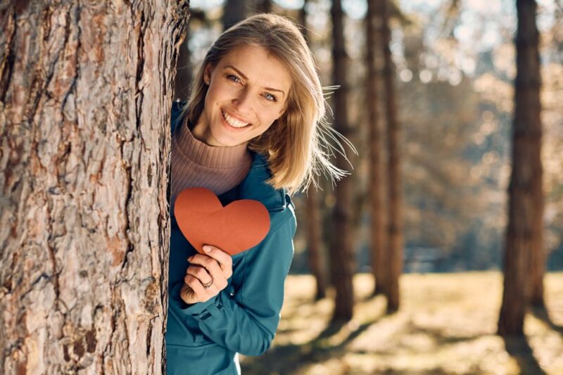 toxic relationship recovery, a girl holding a heart sticker