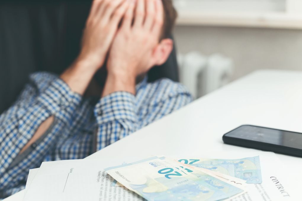 worried about money, man in despair over his financial situation